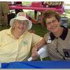 Mom Shorman and Judy, K9 Leisure Consultant share time at Bark in the Park